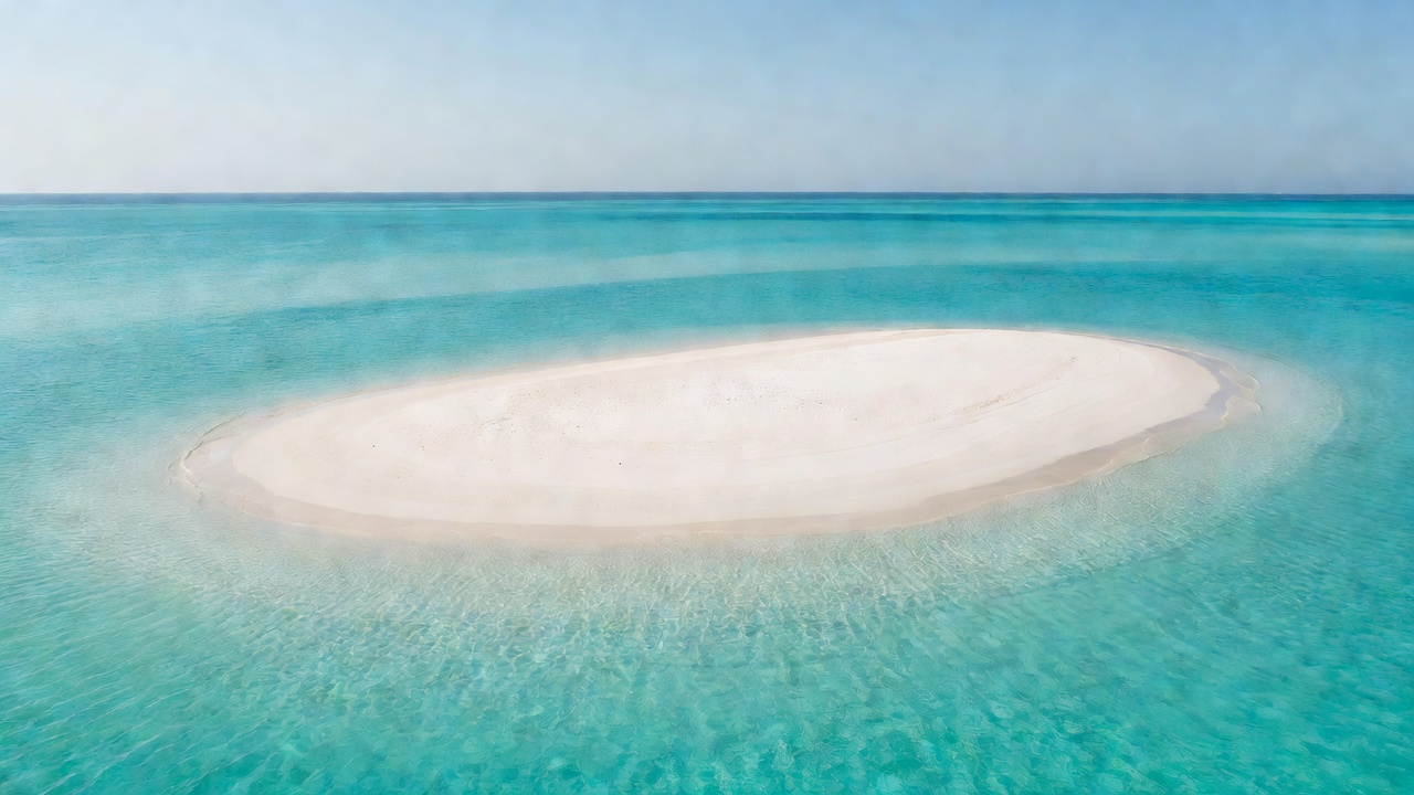 Pristine white sandbank surrounded by turquoise water